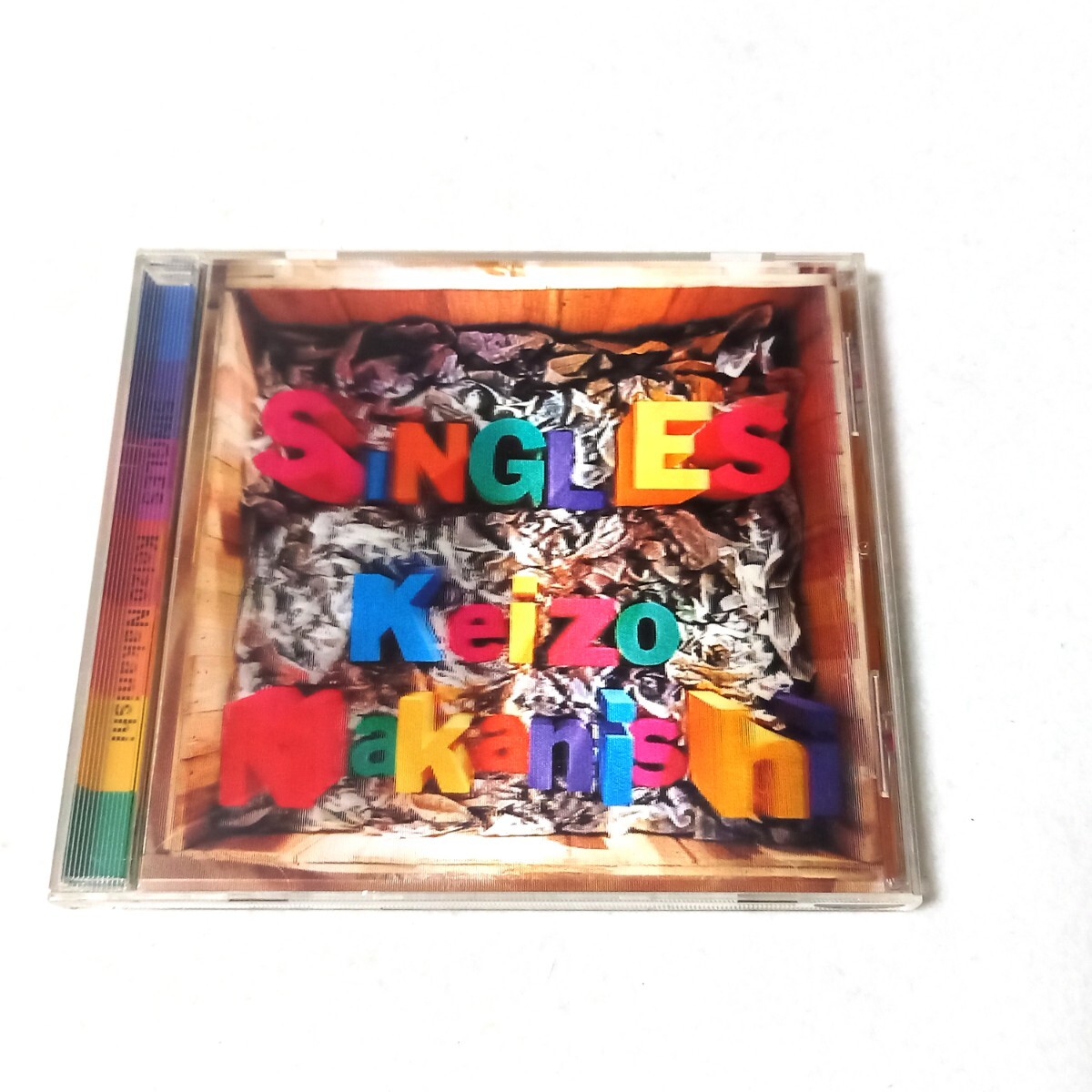 ☆美品☆ 中西圭三 / SINGLES 初回盤 ベスト アルバム CD シングルス Woman/君は君の誇り/A.C.E./タンジェリン・アイズ/非情階段 米倉利紀拍卖