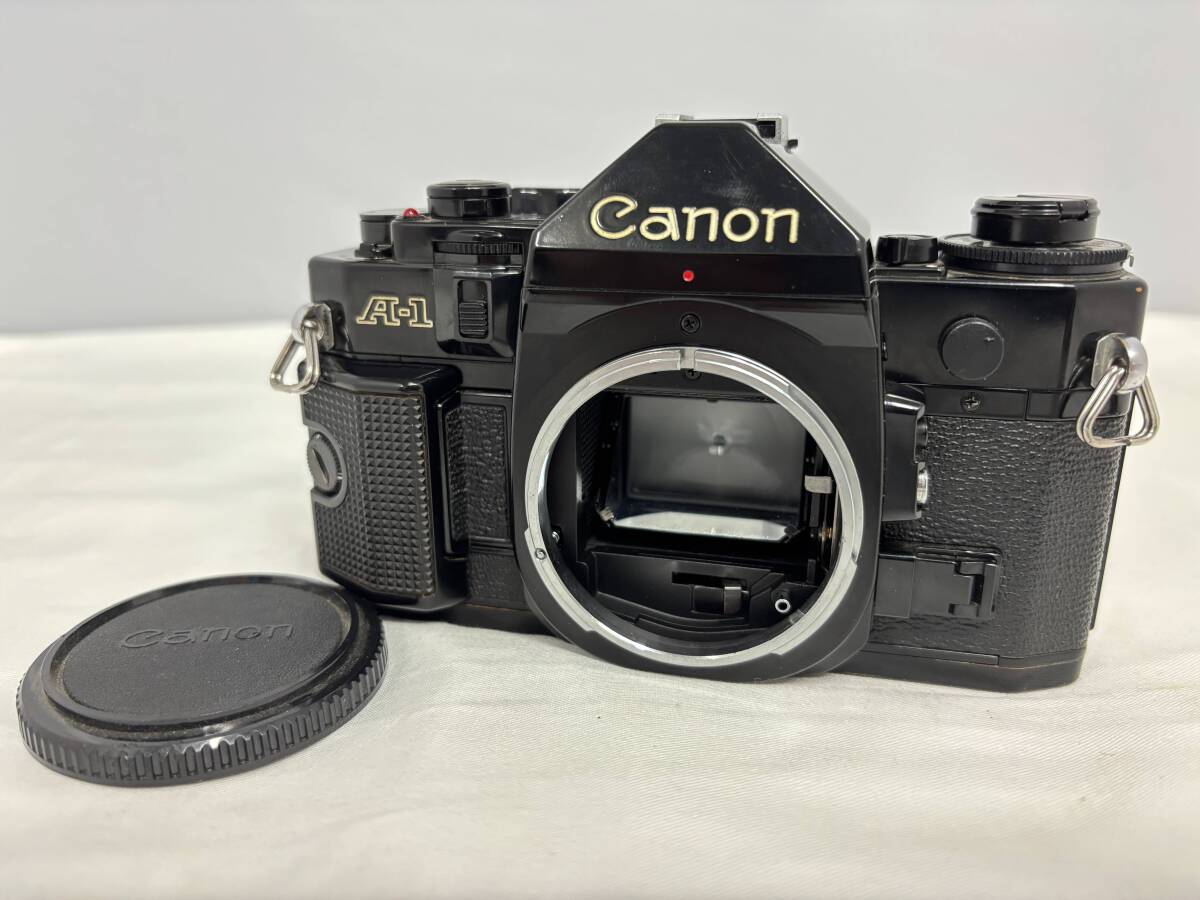 【シャッターOK】 Canon A-1 キャノン フィルムカメラ 一眼レフ ボディ 人気機種 黒 昭和レトロ AE-1上位機種 クラシック 送料無料 Y259拍卖