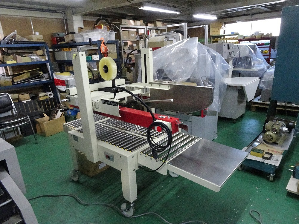 ☆だれでも簡単に段ボールにテープが貼れる簡易型製封函機 ストラパックAS-323/封函機/段ボールの自動テープ貼り機/テーピングマシン ☆拍卖