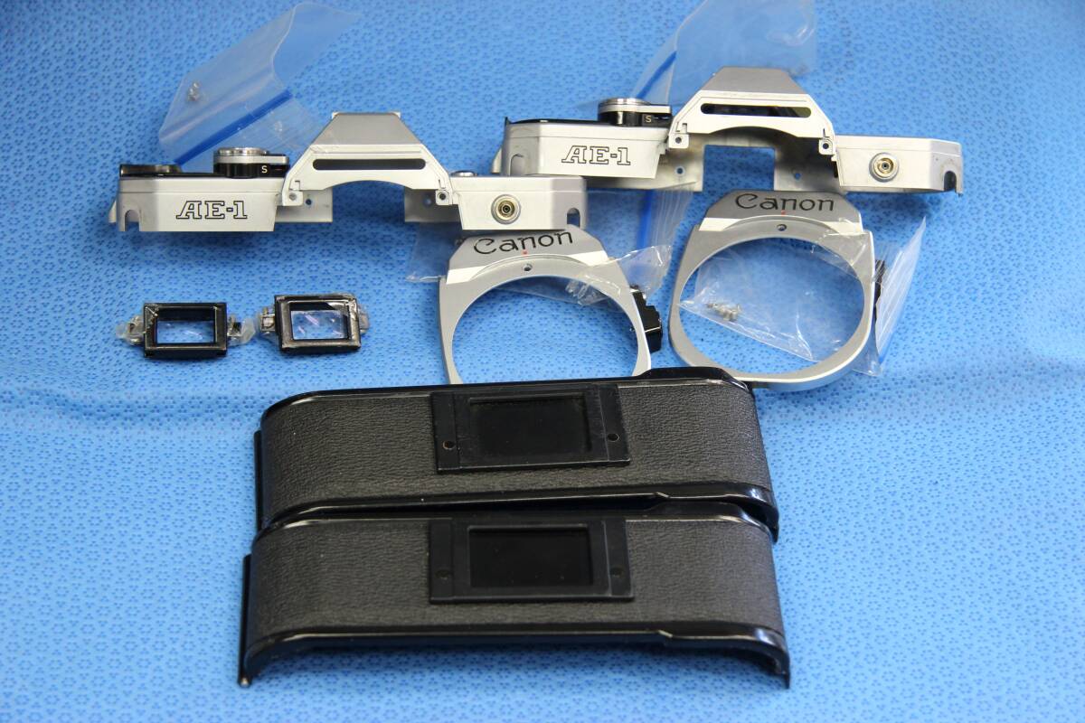Canon キャノン AE-1 パーツ 各2 (裏蓋 、トップカバー 、接眼レンズ)純正ネジ付き拍卖