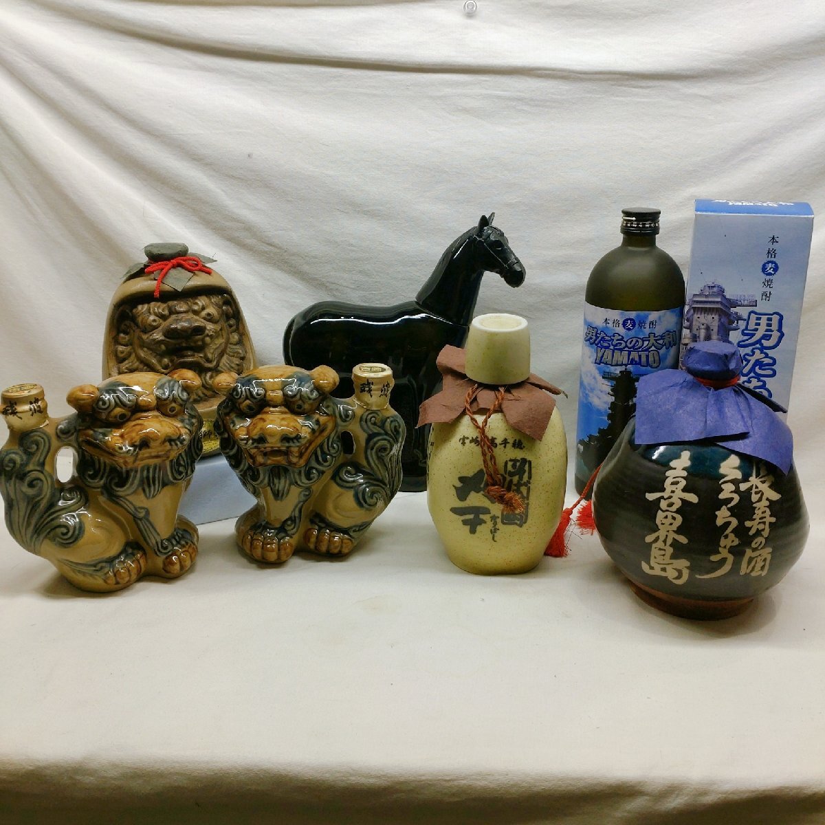 焼酎・泡盛 まとめ売り 喜界島酒造 くろちゅう/高千穂酒造 刈干/神楽酒造 くろうま/比嘉酒造 残波/新里酒造 招福獅子/男たちの大和拍卖