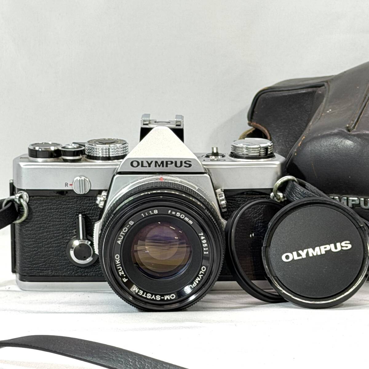 □【シャッター確認済】 OLYMPUS OM-1 OM-SYSTEM F.ZUIKO 1:1.8 f=50mm フィルム 一眼レフカメラ 現状品 □ W03-0320拍卖