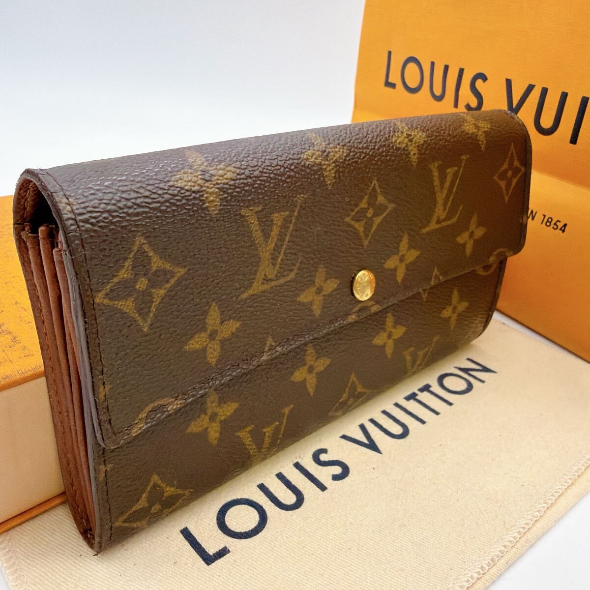 6738【ほぼ極美品】LOUIS VUITTON ルイヴィトン モノグラム ポルトフォイユ サラ 長財布 二つ折り財布 ウォレット M61734/TH1929拍卖