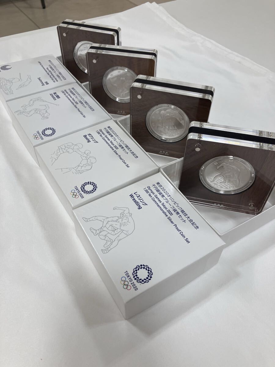 東京2020 オリンピック競技大会記念 千円銀貨幣プルーフ貨幣セット 4種 陸上競技 ボクシング レスリング 水泳拍卖