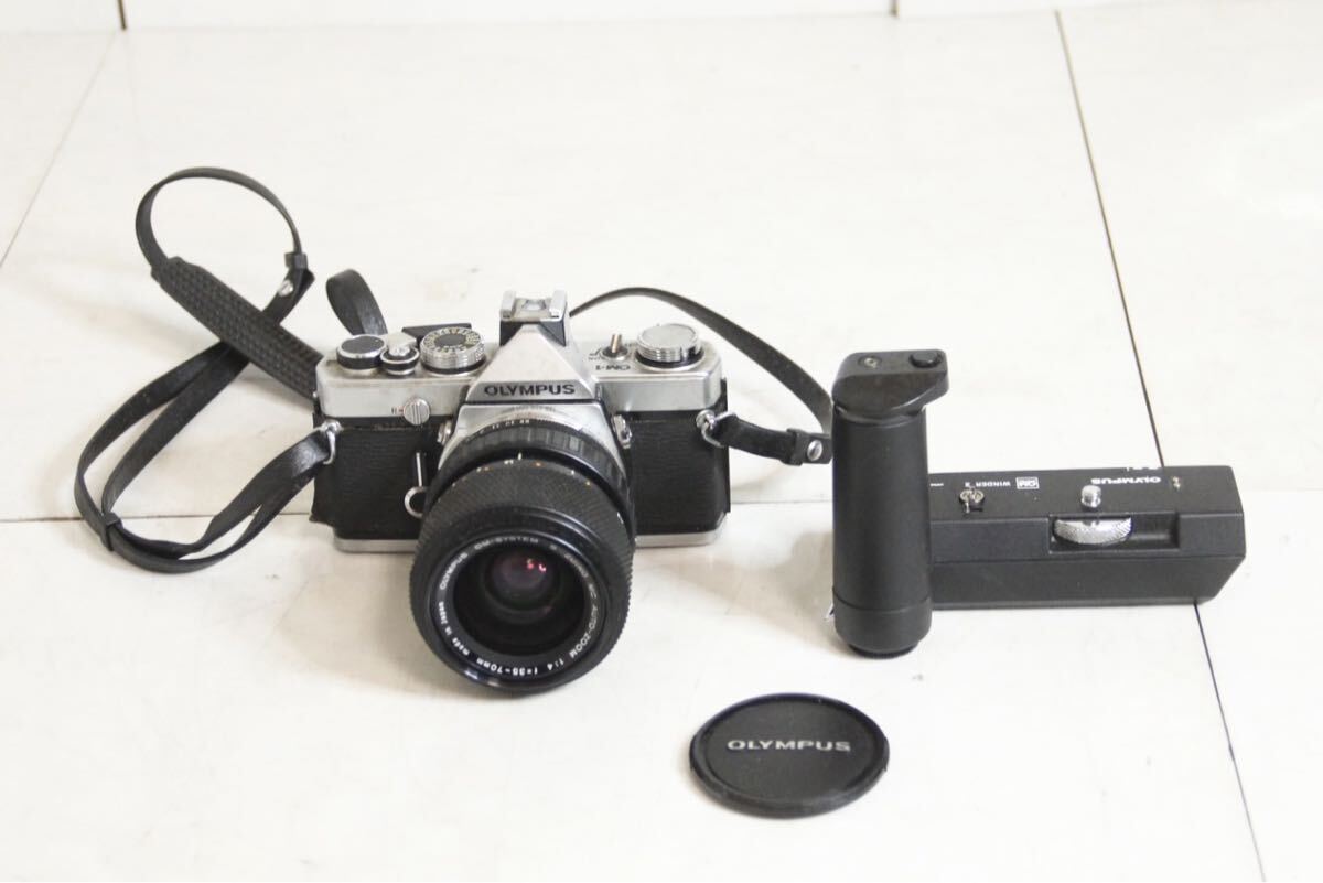OLYMPUS オリンパス OM-1フィルム一眼レフ フィルムカメラ レンズ ZUIKO MC AUTO-ZOOM 1:4 f=35〜70mm 他バッテリー拡張パーツ 拍卖