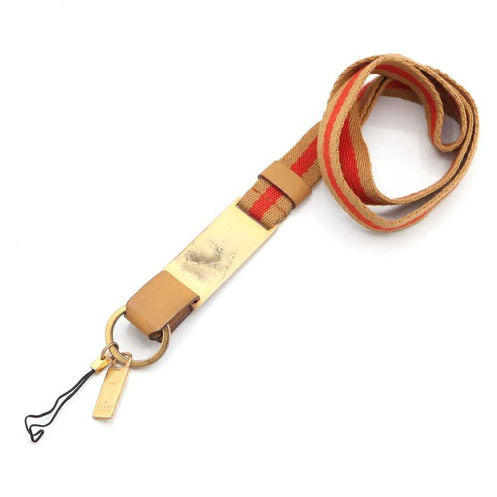 グッチ ネックストラップ ライトブラウン オレンジ ゴールド金具 キャンバス レザー 中古 キーリング 携帯ストラップ拍卖