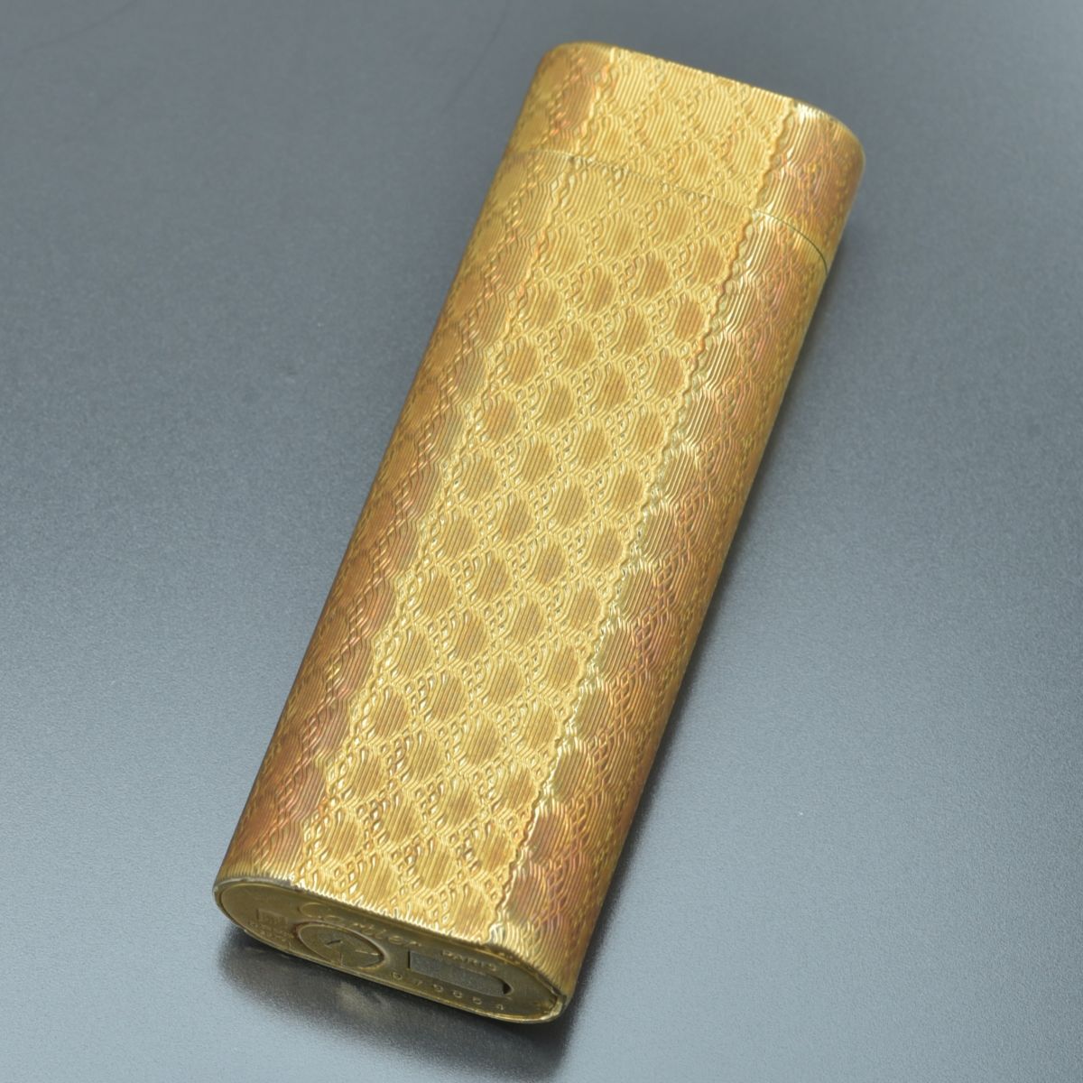 美品 カルティエ ガスライター ローラー式 PL OR GALVA 20MC 着火OK シリアル入 総柄 ゴールド Cartier オーバル ブランド #N※0325-69/b.g拍卖