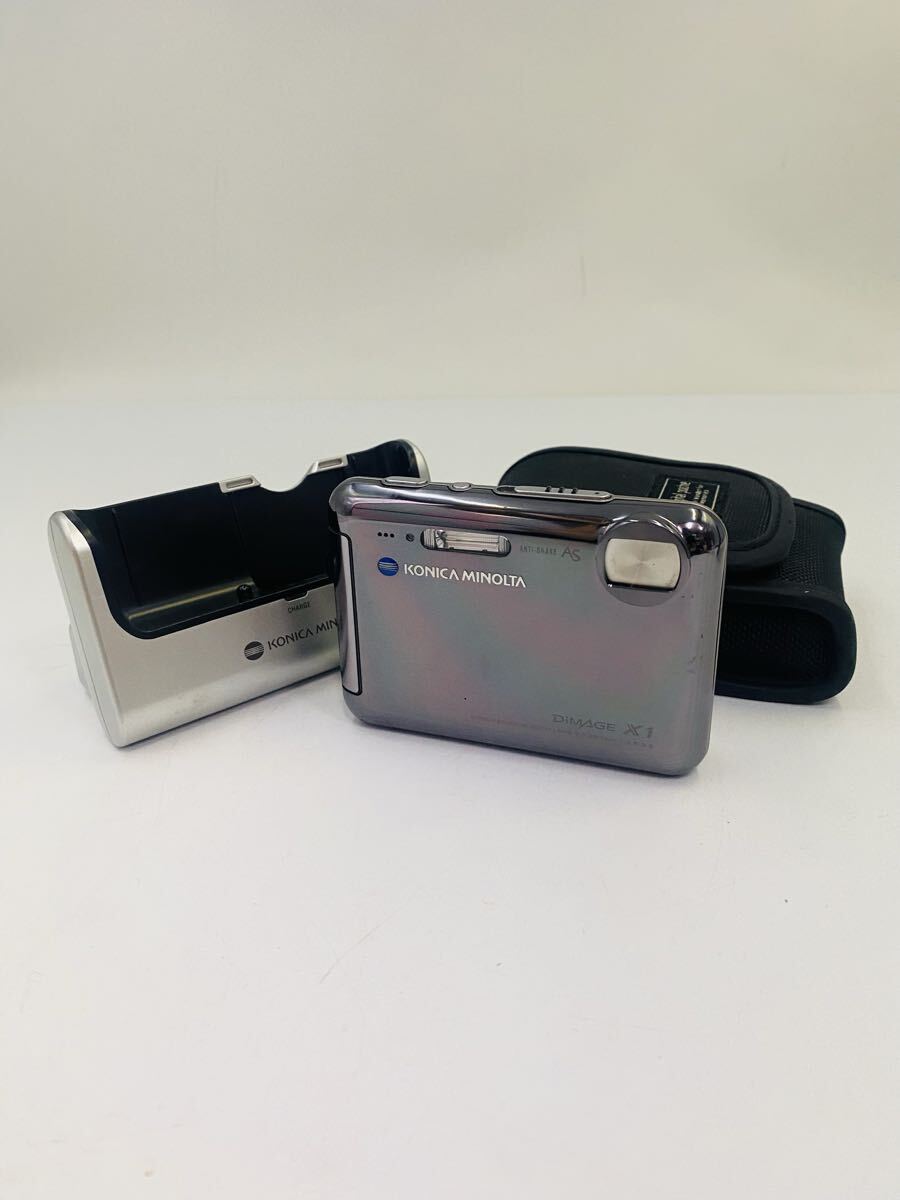◇ KONICA MINOLTA DiMAGE X1 コニカミノルタ コンパクトデジタルカメラ デジタルカメラ バッテリー有 スタンド付 ケース付 通電のみ確認済拍卖