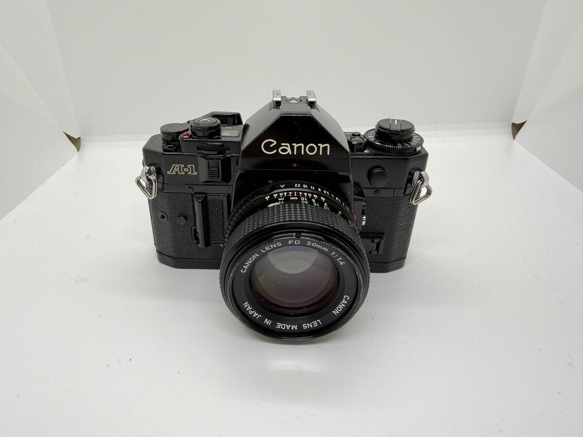 Canon A-1 New FD 50mm f1.4 レンズ付き フィルムカメラ拍卖