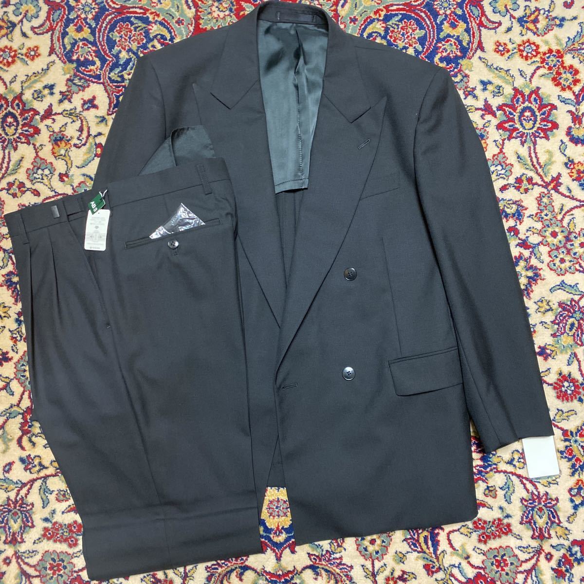 新品 未使用 激安 タグ付き ウール100% 礼服 ダブル 上下セット サイズA7 ブラック 冠婚葬祭 アジャスター付き サラサラ生地拍卖