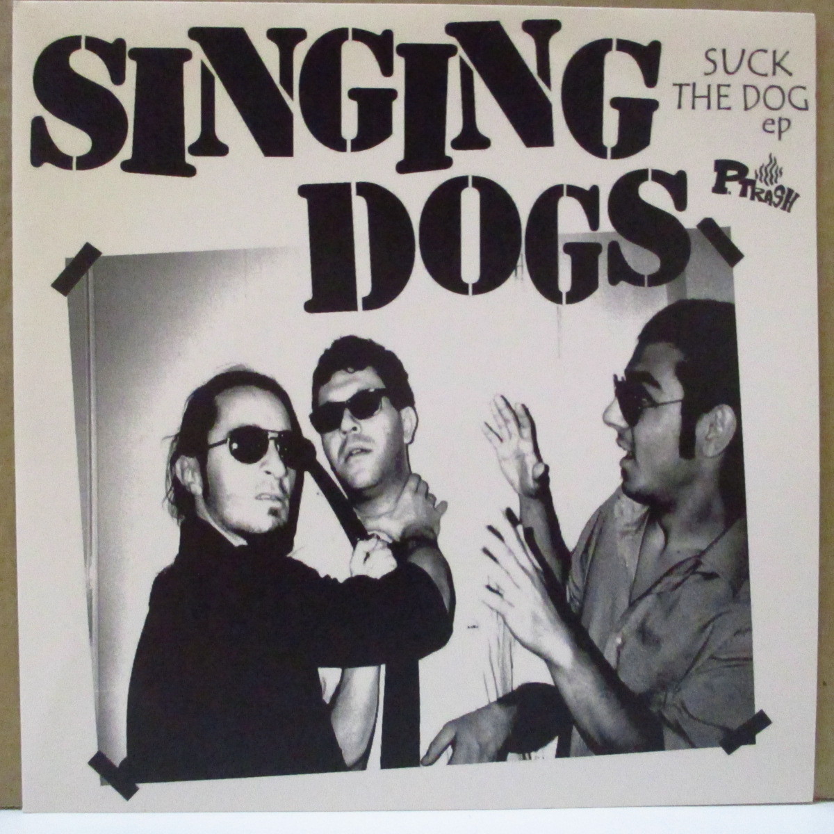 SINGING DOGS-Suck The Dog (German 154 Ltd.Clear Green Vinyl拍卖