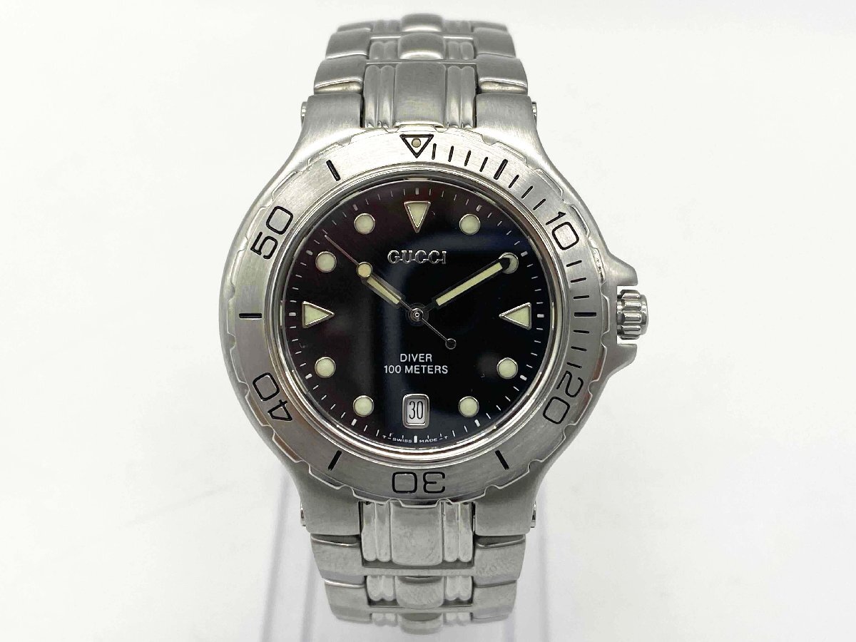 ◆【動作未確認】GUCCI グッチ メンズ腕時計 ダイバー 9750M デイト クオーツ 100m 黒文字盤◆/T拍卖