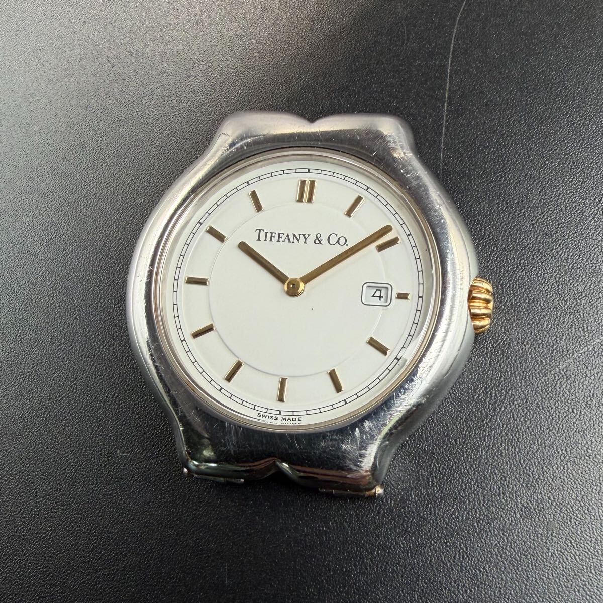 TIFFANY & CO. ティファニー ティソロ 腕時計 M0112 シルバー/ゴールド デイト クォーツ ジャンク拍卖