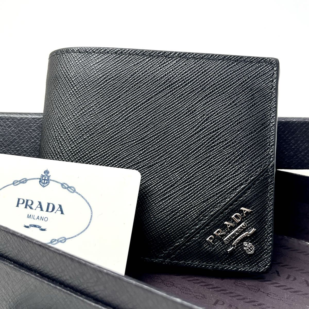 ●近年モデル PRADA プラダ 二つ折り財布 三角ロゴ メタルロゴ サフィアーノメタル 2MO738 黒 ブラック コインケース メンズ 本革 レザー拍卖