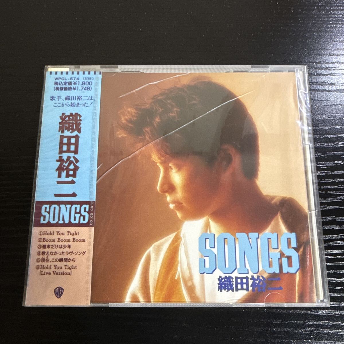 3633【新品未開封】織田裕二 / SONGS初期シングル集・「Hold You Tight」収録の91年盤拍卖