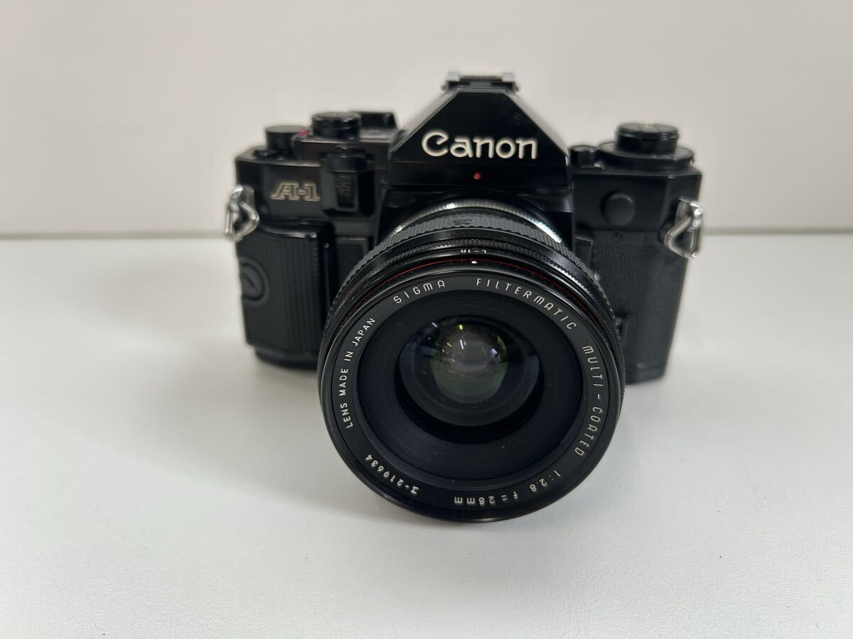 ③1円〜Canon A-1 フィルムカメラ キャノン レンズ付き拍卖