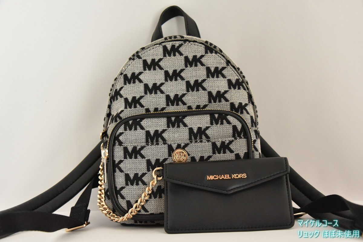 鑑定済 未使用に近い マイケルコース Michael Kors MKシグネチャー ミニリュック グレー 黒拍卖