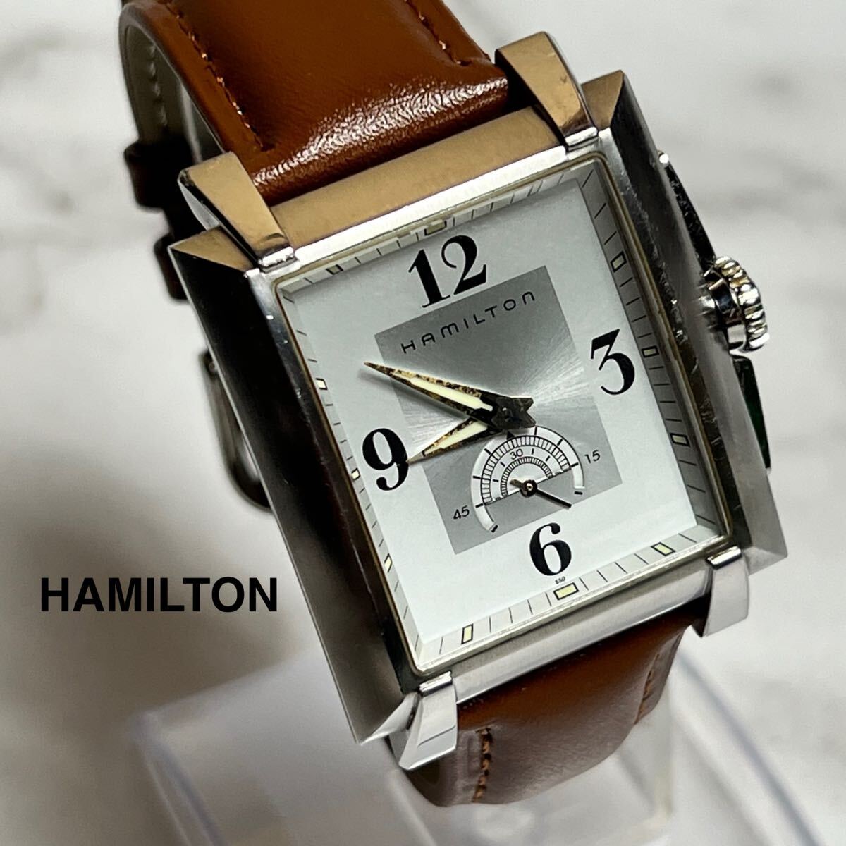 稼働品 HAMILTON ハミルトンメンズ腕時計 H304110 トレント クォーツ スクエア スモセコ スイス製 シルバー×ホワイト系文字盤拍卖