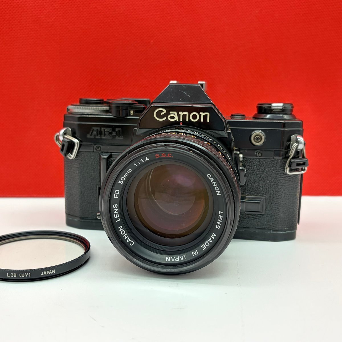R10 Canon AE-1 LENS FD 50mm F1.4 S.S.C. フィルム一眼レフカメラ 動作品 キャノン拍卖