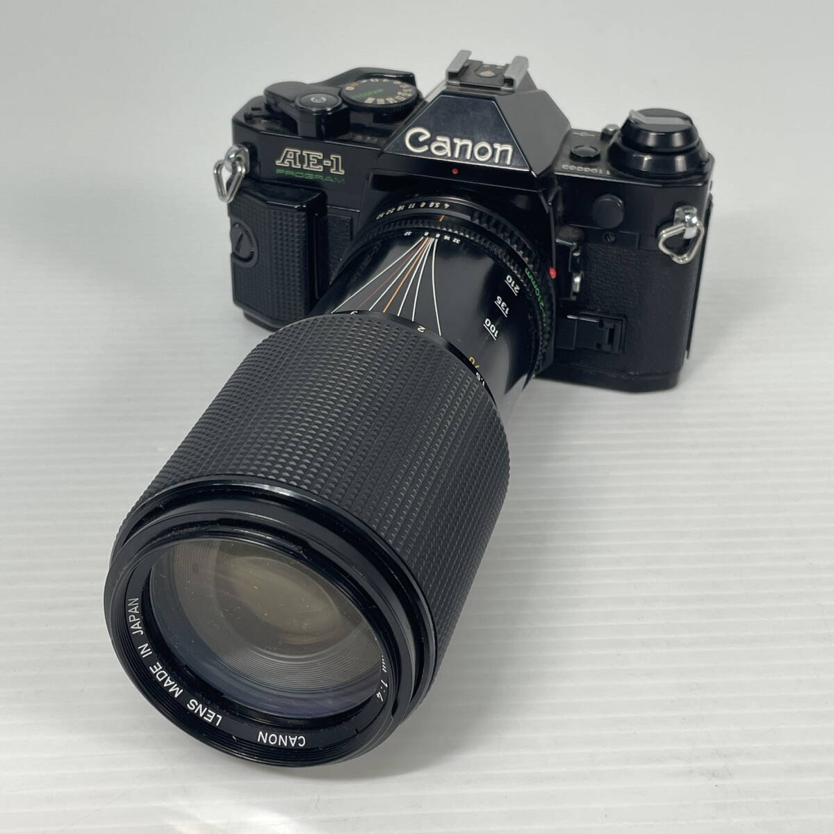 2605K0111 Canon キャノン フィルムカメラ AE-1 PROGRAM/レンズ CANON ZOOM LENS FD 70-210mm 1:4 通電確認済 現状品拍卖