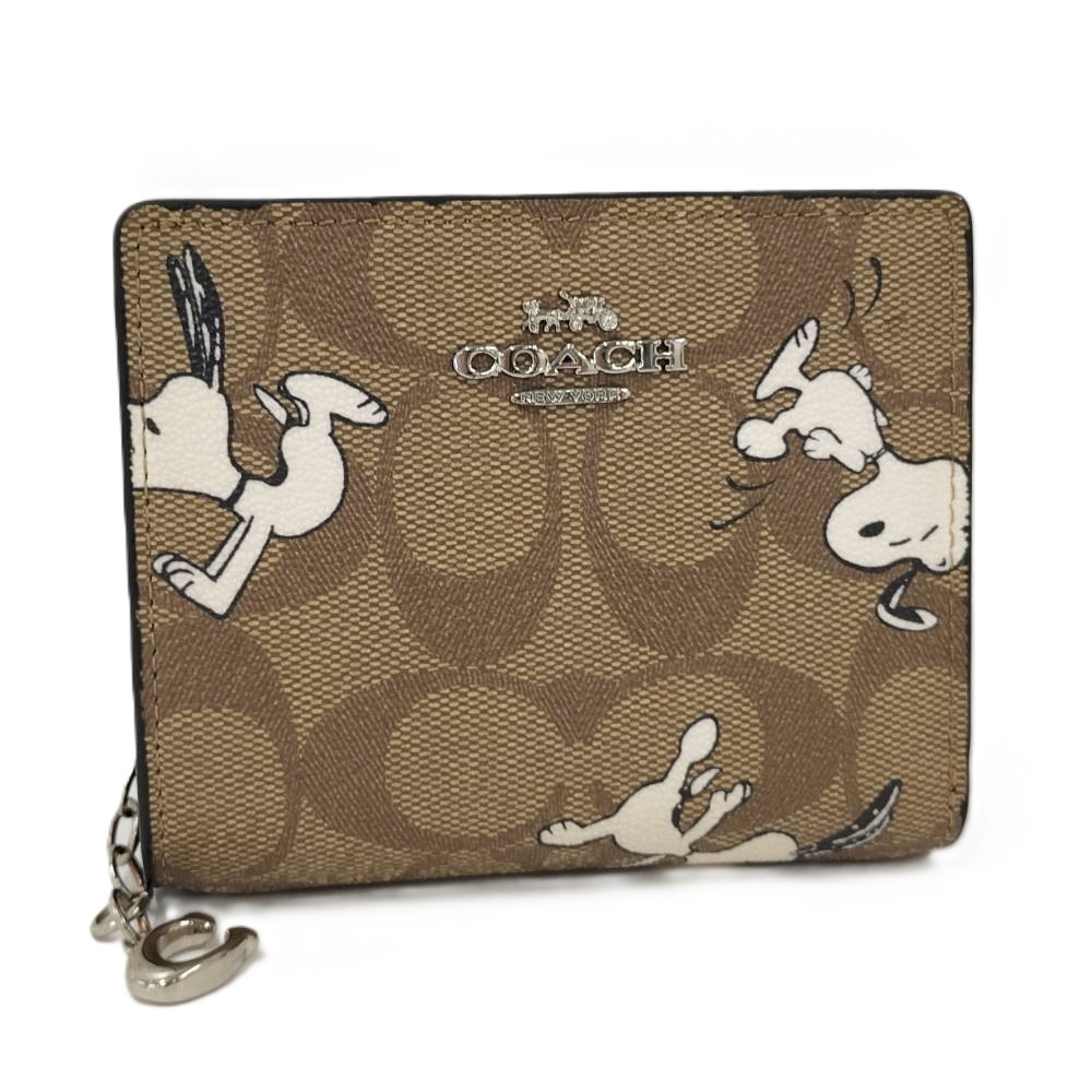 COACH コンパクト財布 二つ折り財布 ピーナッツ コラボ スヌーピー シグネチャー PVCコーティング C4591拍卖
