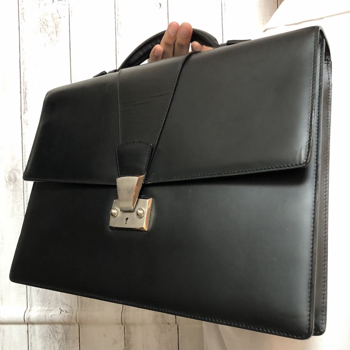 極美品●カルティエ Cartier ブリーフケース ハンドバッグ ビジネスバッグ メンズ 大容量 A4 書類 レザー 本革 ブラック 黒 ロゴ 金具拍卖