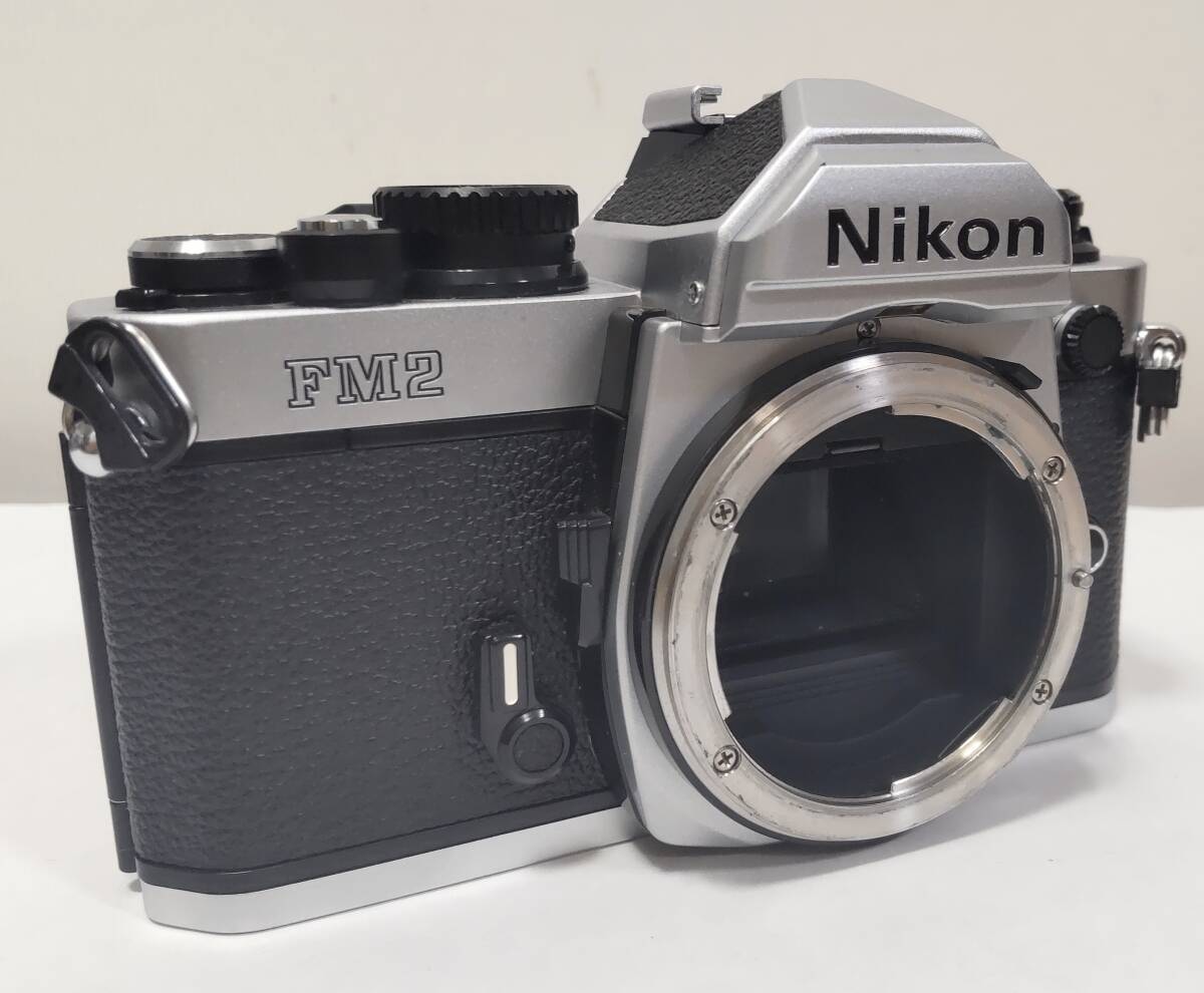 【UM16928】中古現状渡し Nikon ニコン FM2 シルバーボディ フィルム一眼レフカメラ シャッター音及び巻き上げのみ確認 その他動作未確認拍卖