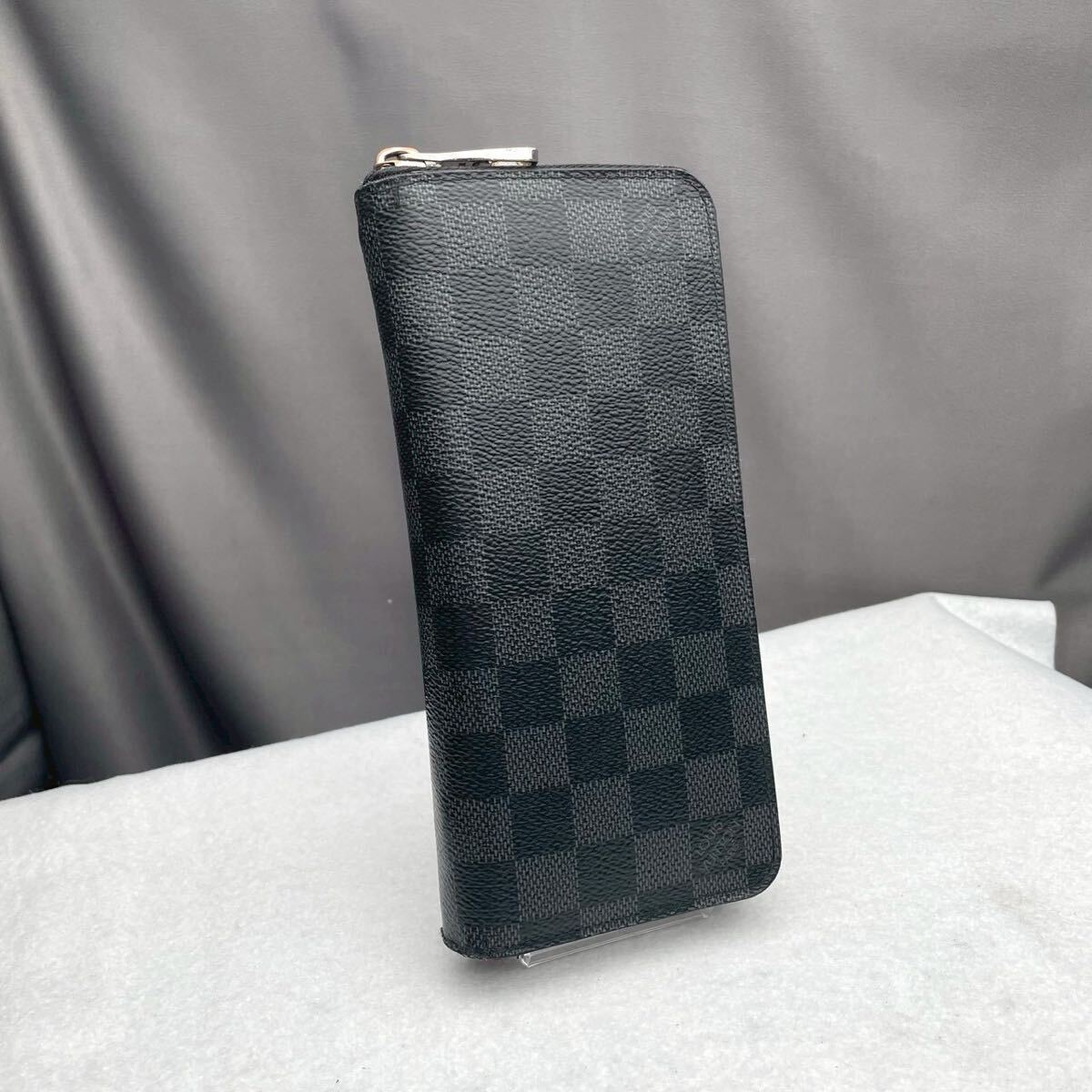 B502 LOUIS VUITTON ルイヴィトン ダミエ グラフィット 長財布 ヴェルティカル ジッピー N63095 シリアルナンバー GI1167拍卖