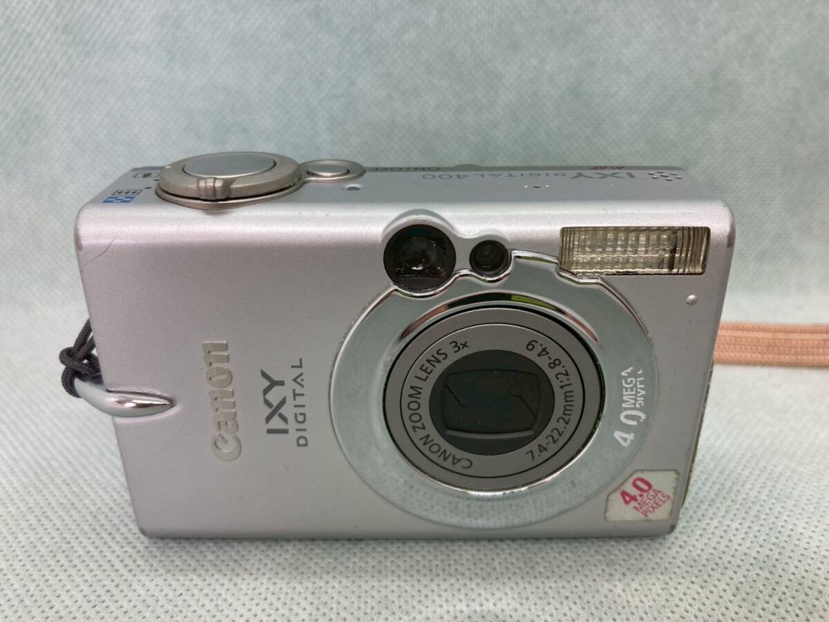 Canon IXY DIGITAL400 キヤノン キャノン コンパクトデジタルカメラ デジカメ シルバー 銀 ピンクベージュ巾着付き 動作未確認 現状品拍卖