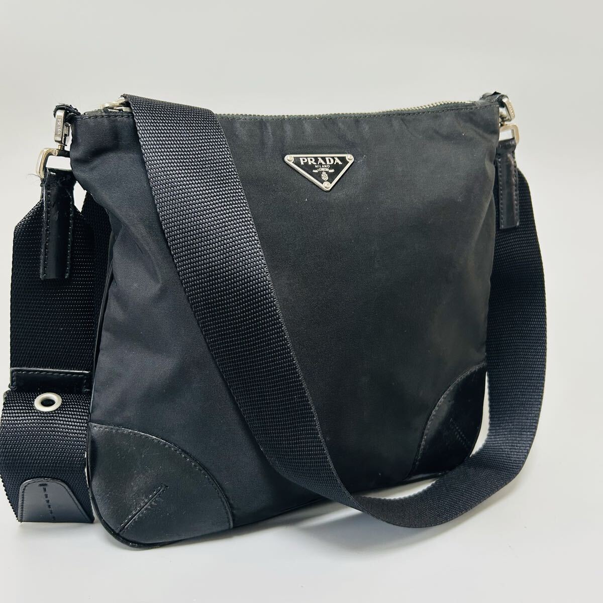 1円 PRADA プラダ テスートナイロン 三角プレートクロスボディ ショルダーバッグ 斜め掛け メンズ レディース ブラック系正規品本物拍卖