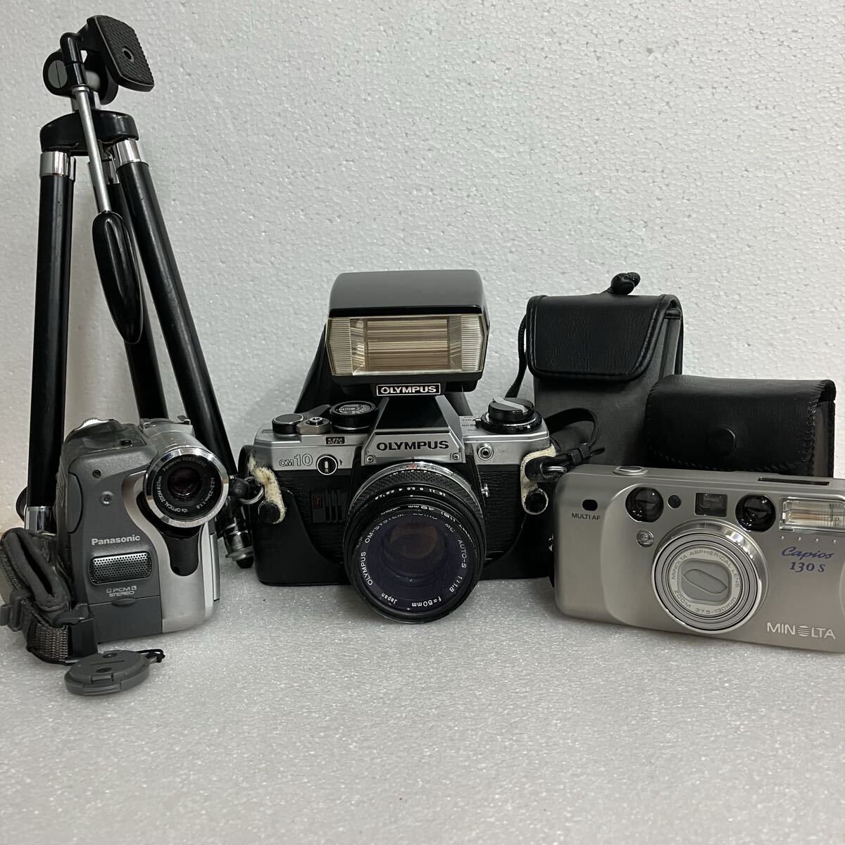 【K】OLYMPUS OM-10 MINOLTA Capios130S Panasonic NV-GS50 三脚 フラッシュ付 カメラ5点まとめ ジャンク拍卖