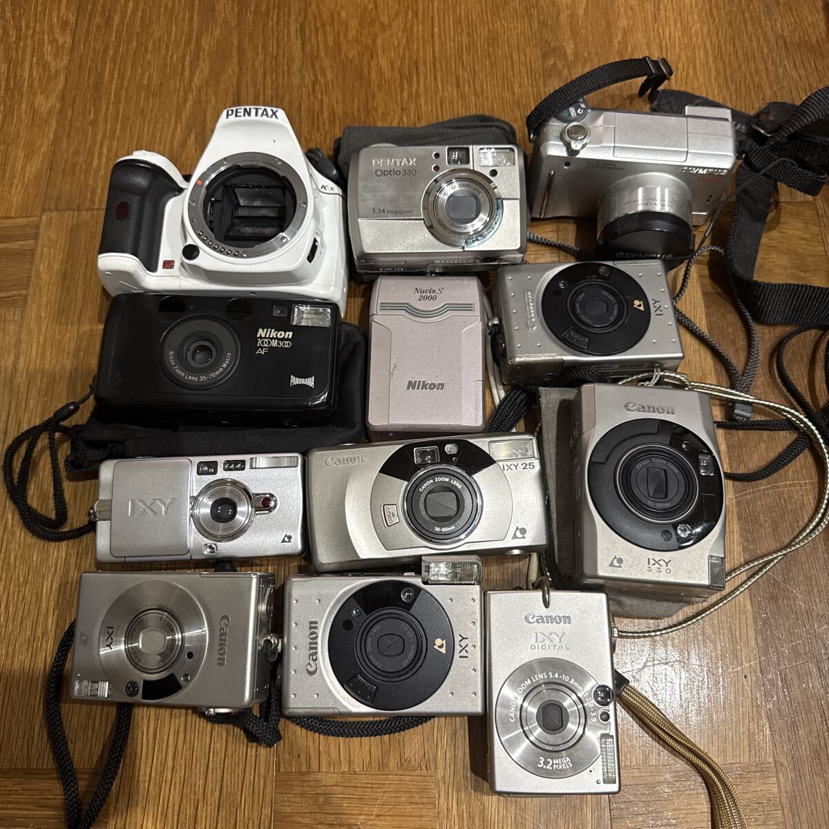 デジタルカメラ まとめ売り 12台 Canon Nikon PENTAX OLYMPUS ジャンク拍卖