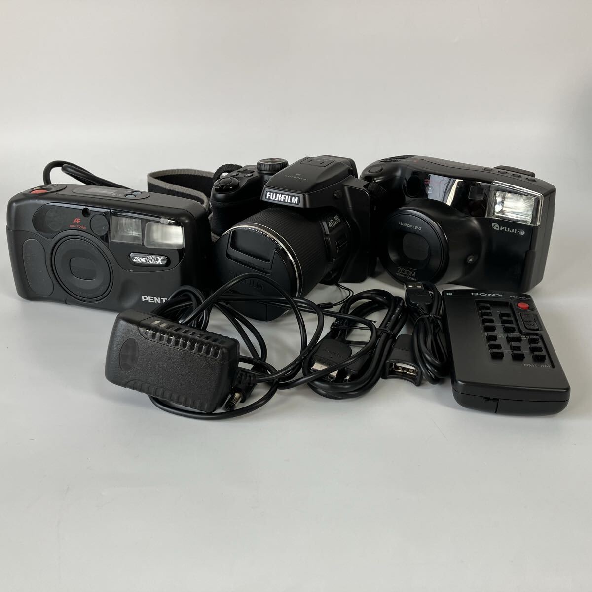 カメラ3点セット! デジタルカメラ フィルムカメラ ケーブル リモコン など 富士フィルム FUJIFILM PENTAX SONY FinePix S8200拍卖
