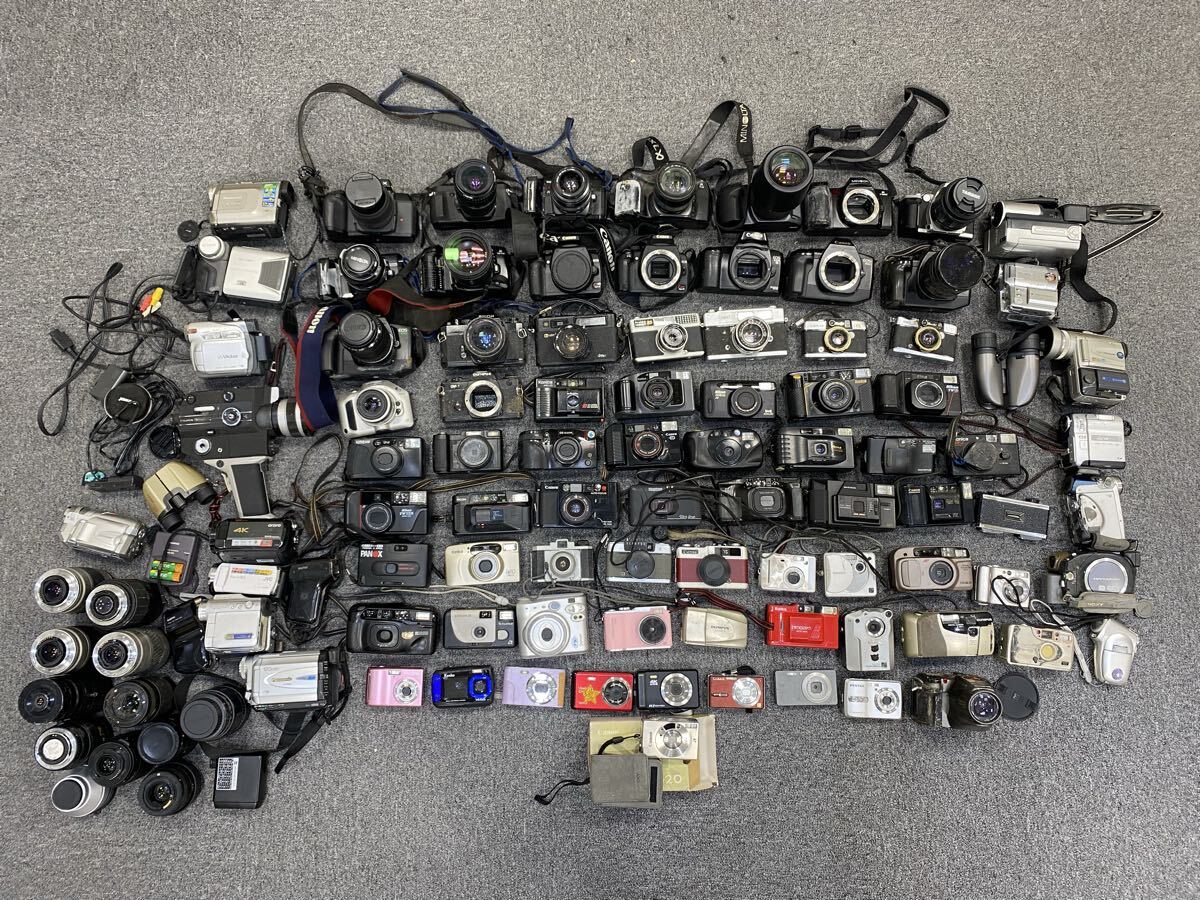 カメラ大量おまとめ キャノン ニコン オリンパス 一眼レフ デジカメ レンズ フィルムカメラ OM-1など 計105個 動作未確認 A015拍卖