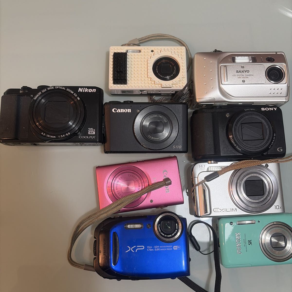 1円スタート TJ100 デジカメ 9個 セット まとめ Nikon Canon CASIO SONY FUJIFILM PENTAX 動作未確認 現状品拍卖