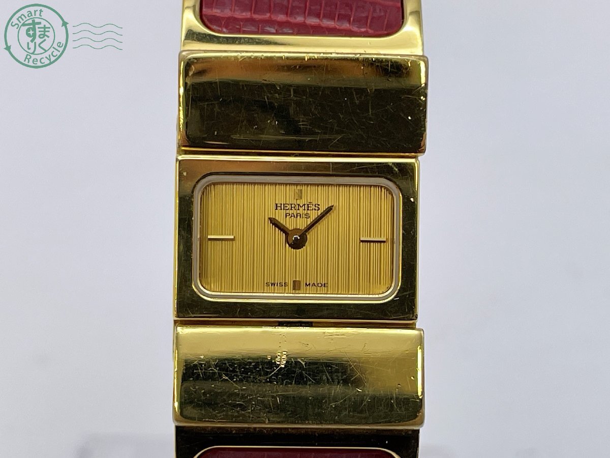 CF1005729 △ 1円~! HERMES エルメス ロケ L01.201 バングルウォッチ クォーツ アナログ レディース 腕時計 2針 ゴールド系 中古拍卖
