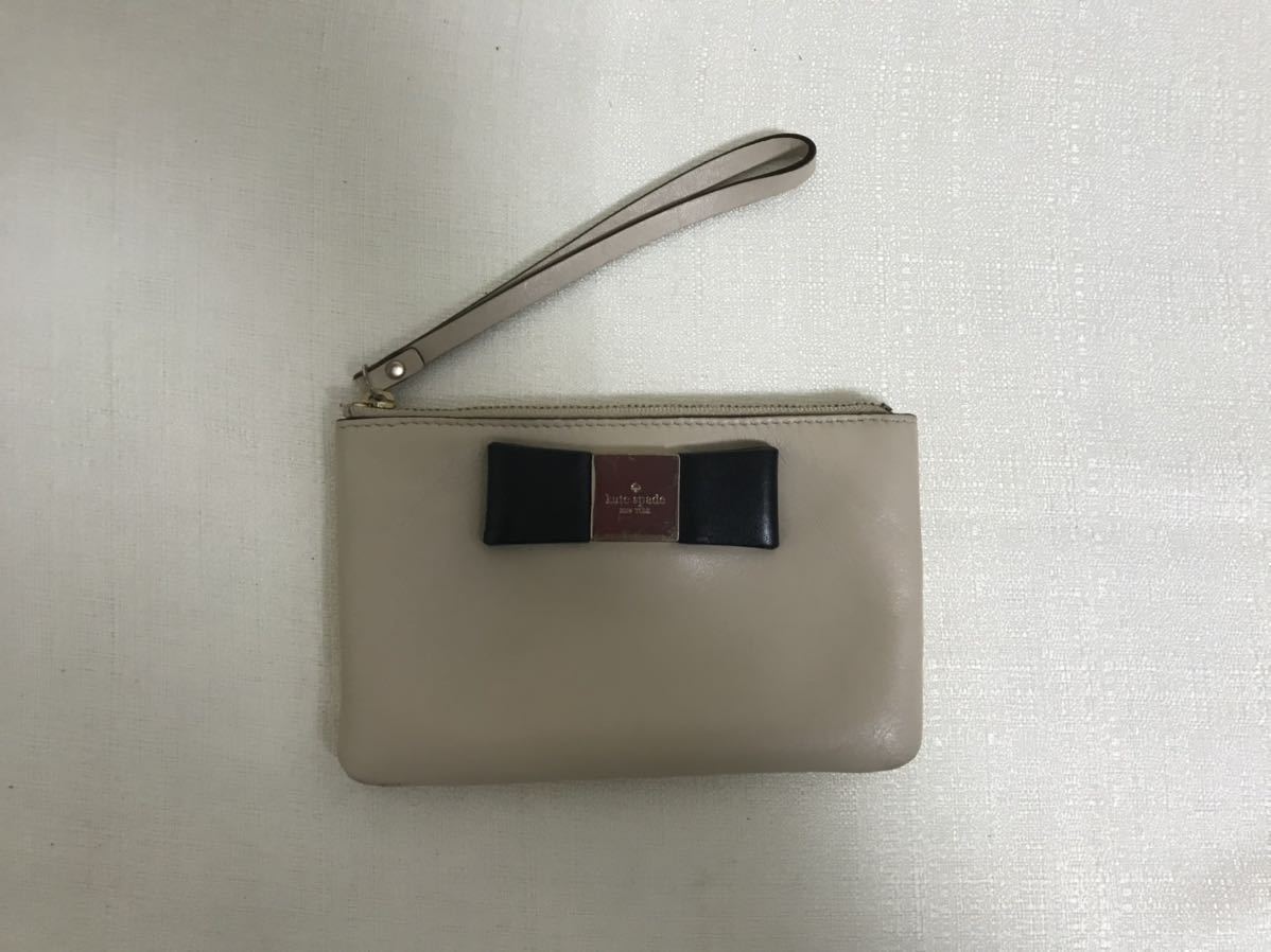 本物ケイトスペードKatespade本革レザーリボンポーチバックコスメバッグ白ホワイト旅行トラベルレディース拍卖