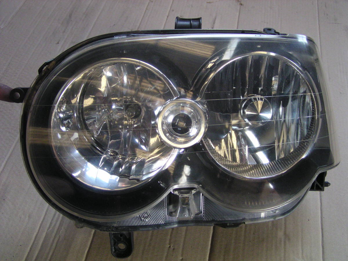 □ ムーブカスタム ターボ L150S 左 ヘッドライト HID レベライザー拍卖