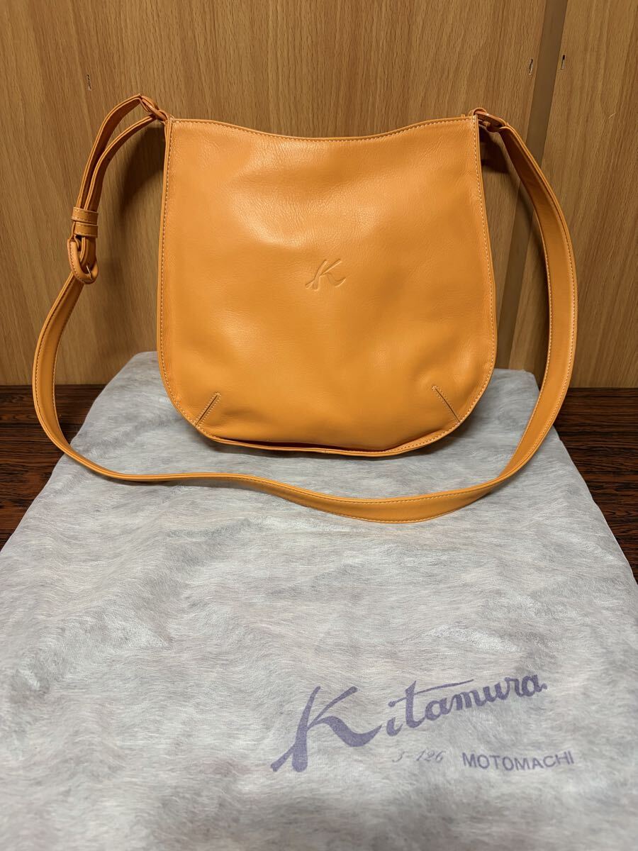 Kitamura キタムラ ショルダーバッグ レザー オレンジ Kロゴ 刻印 保存袋付拍卖