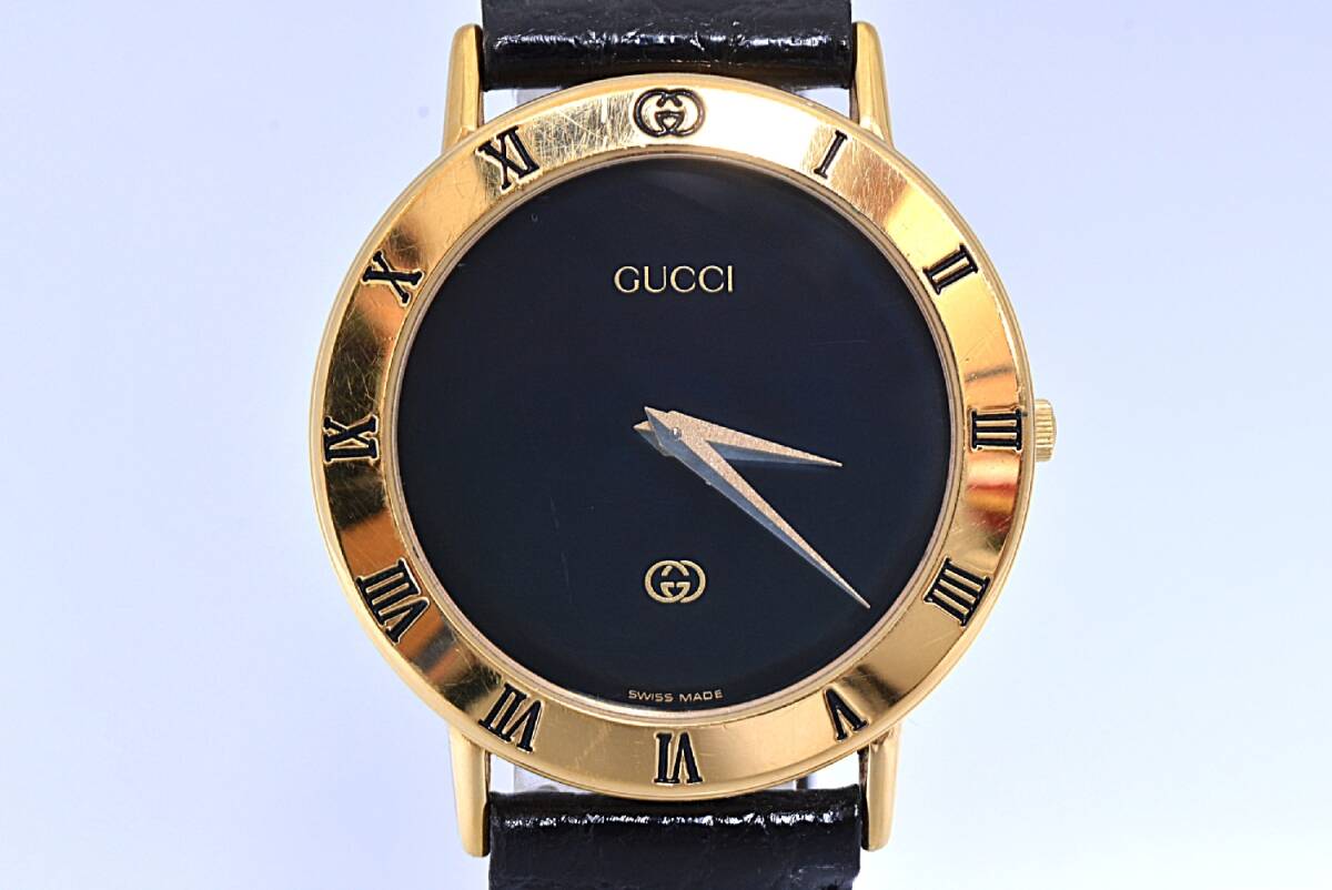 【電池交換済】GUCCI ☆ グッチ / 3000M ゴールド ローマンベゼル 黒文字盤 / クォーツ メンズ 腕時計 / 10M金張り / ケース拍卖