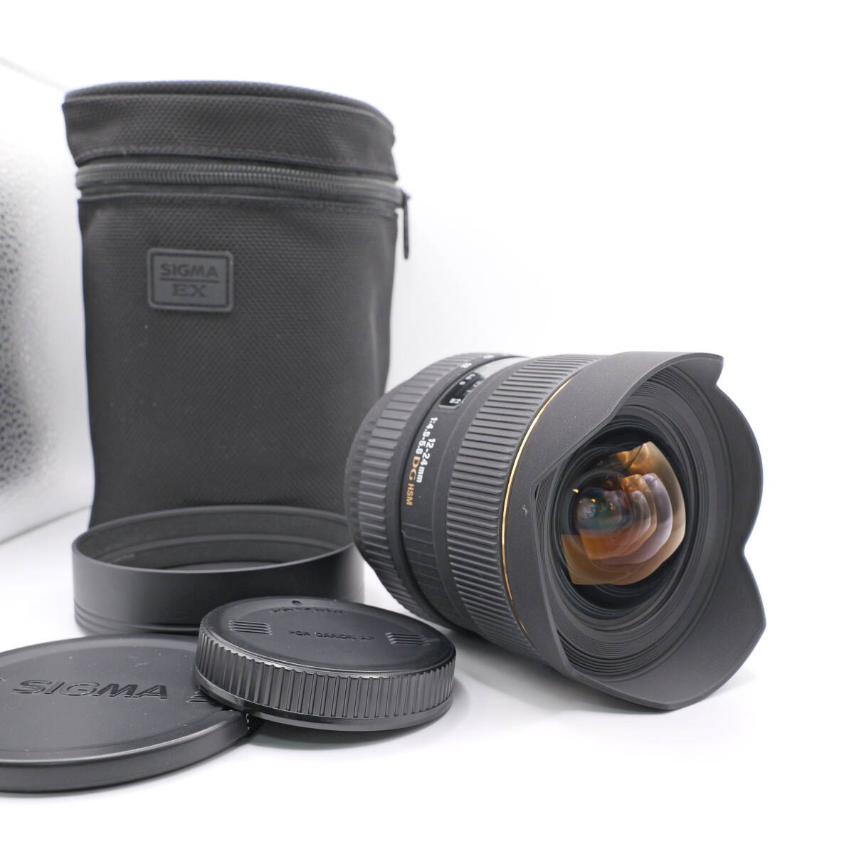 【かめら屋】外観美品 SIGMA シグマ 12-24mm F4.5-5.6 DG HSM for CANON キャノンEFマウント用 中レンズに薄曇りあり 動作確認済 #295拍卖
