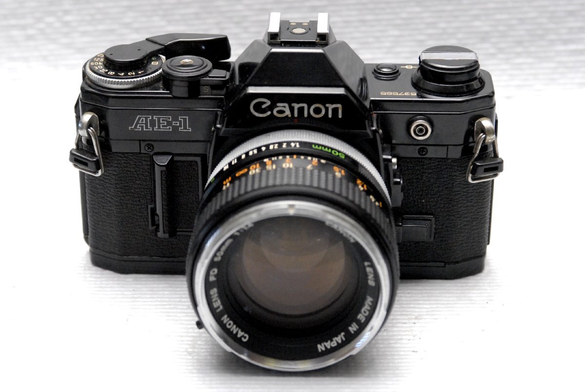 Canon キャノン人気の高級一眼レフカメラAE-1(黒)ボディ +(純正50mm単焦点レンズ1:1.4付) 希少な作動品 (鳴きなし)拍卖