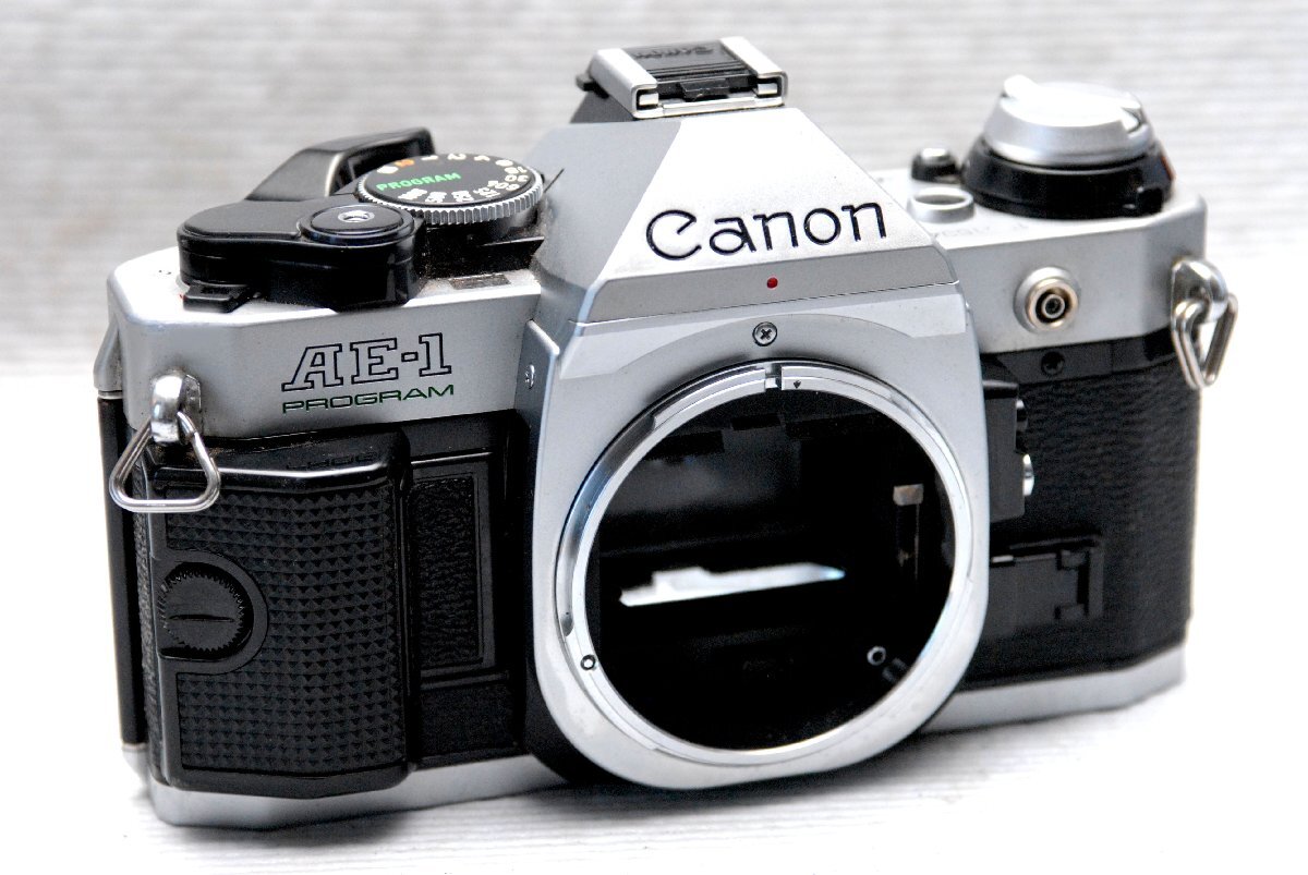 Canon キャノン人気の一眼レフカメラAE-1PROGRAMボディ 希少な作動品 (鳴きなし)(腐食無し)拍卖