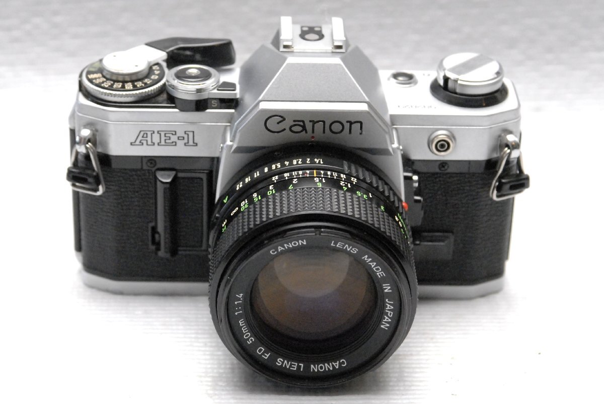 Canon キャノン人気の高級一眼レフカメラAE-1ボディ +(純正50mm単焦点レンズ1:1.4付) 希少な作動品 (鳴きなし)拍卖