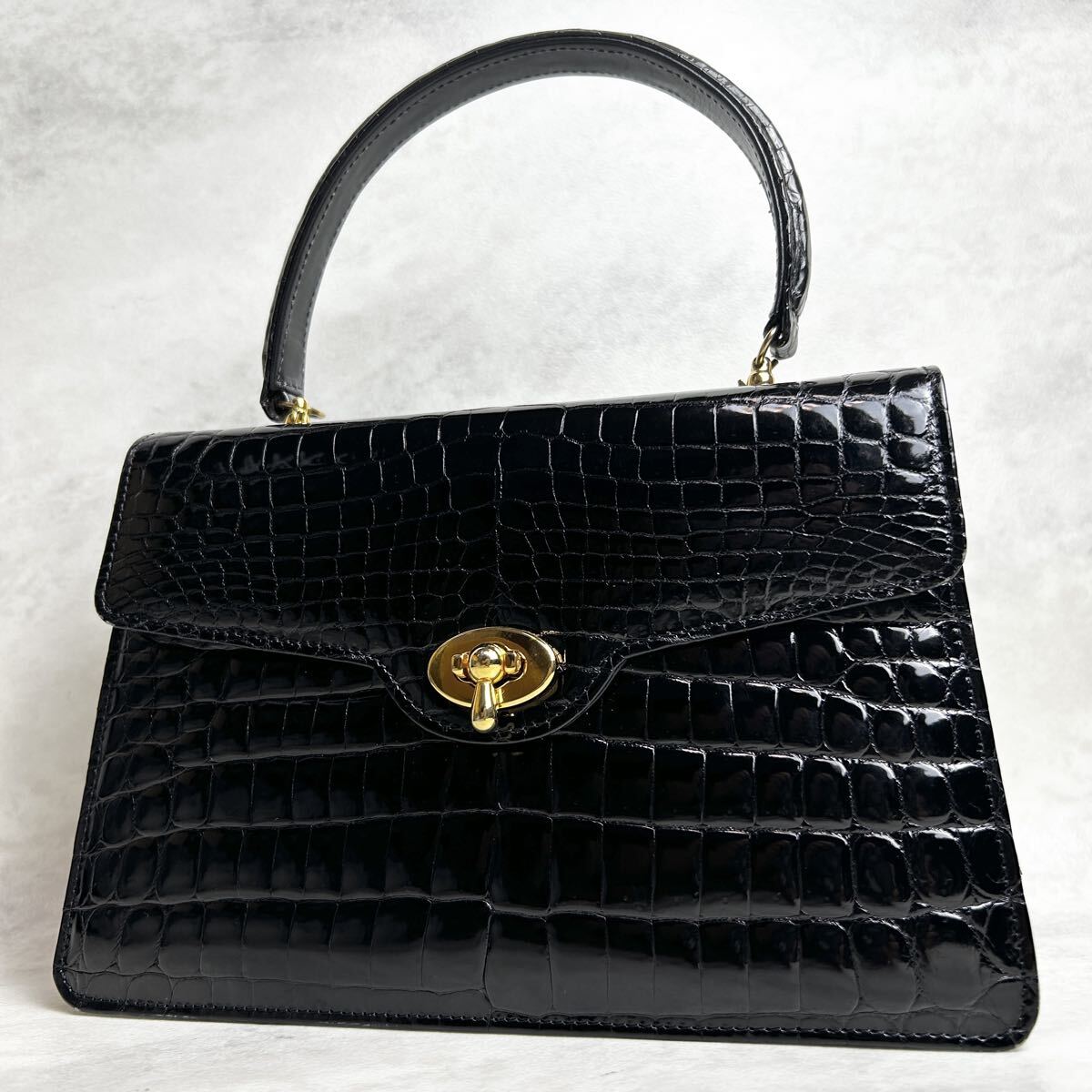 【定価50万円】シャイニングクロコ クロコダイル 鰐革 エキゾチックレザー 金具 フォーマル ハンドバッグ ブラック拍卖