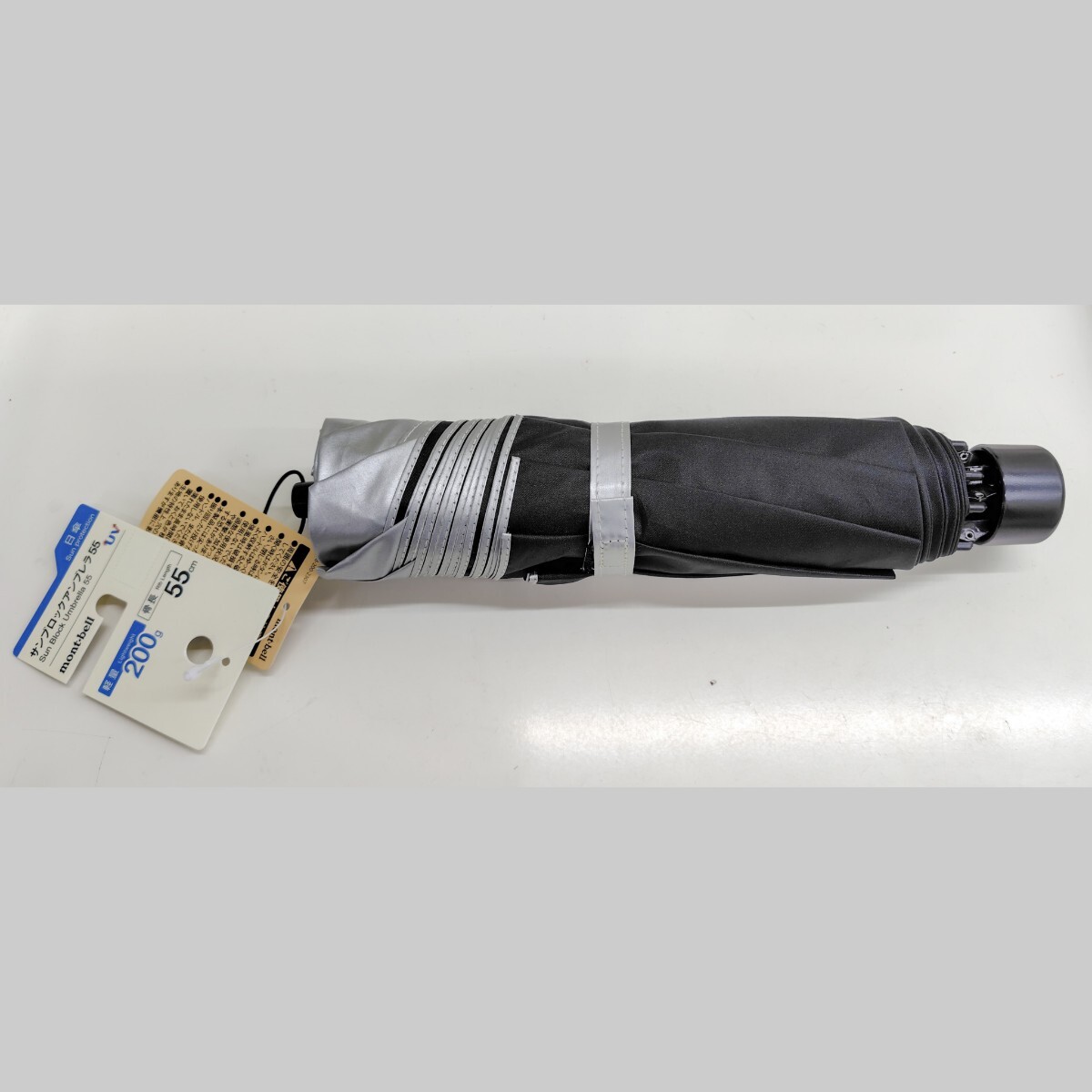 1円スタート 新品 モンベル 日傘 送料無料 晴雨兼用折りたたみ傘 サンブロックアンブレラ55 SV ライトグレー シルバー 元タグ付き拍卖