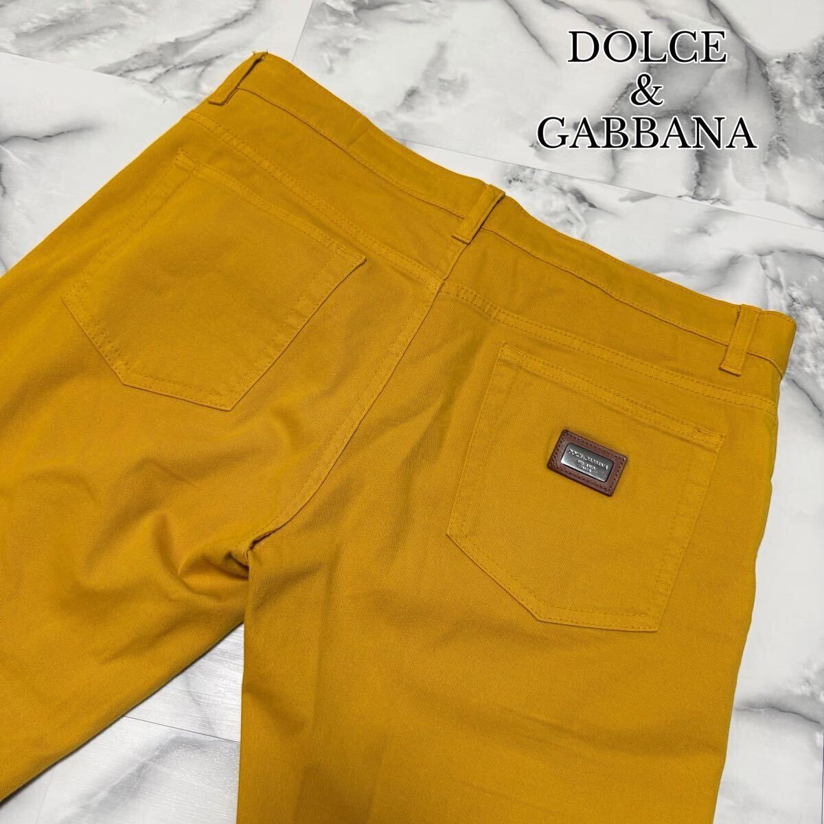 極美品●希少L! ドルチェ&ガッバーナ デニムパンツDOLCE&GABBANA GOLD ロゴメタルタグ レザー DG刻印 ストレッチ 48 イタリア製 イエロー拍卖