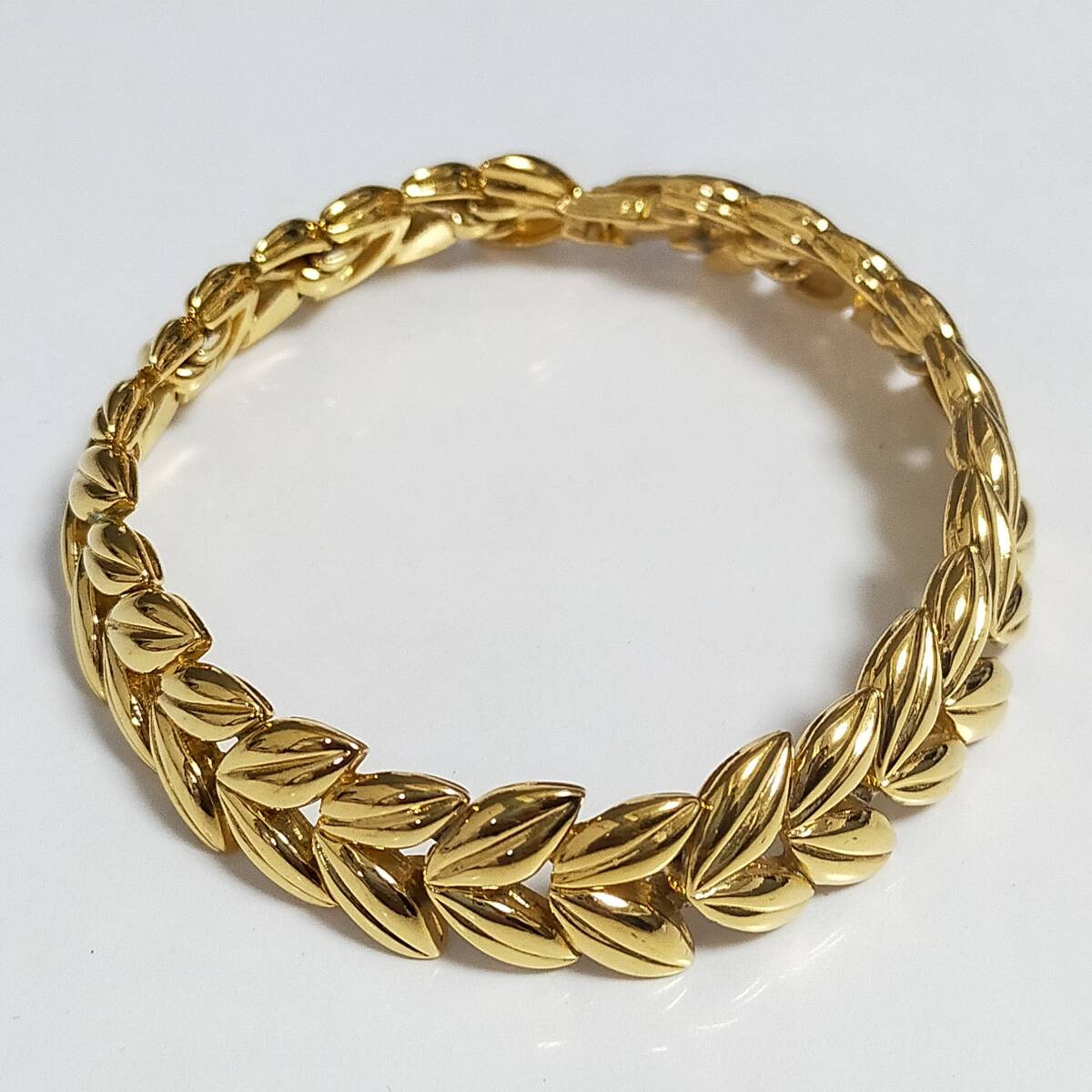 588/5 GJ83122 NINA RICCI ニナリッチ バングル ブレスレット リーフモチーフ 葉 ゴールドカラー ヴィンテージ アクセサリー拍卖