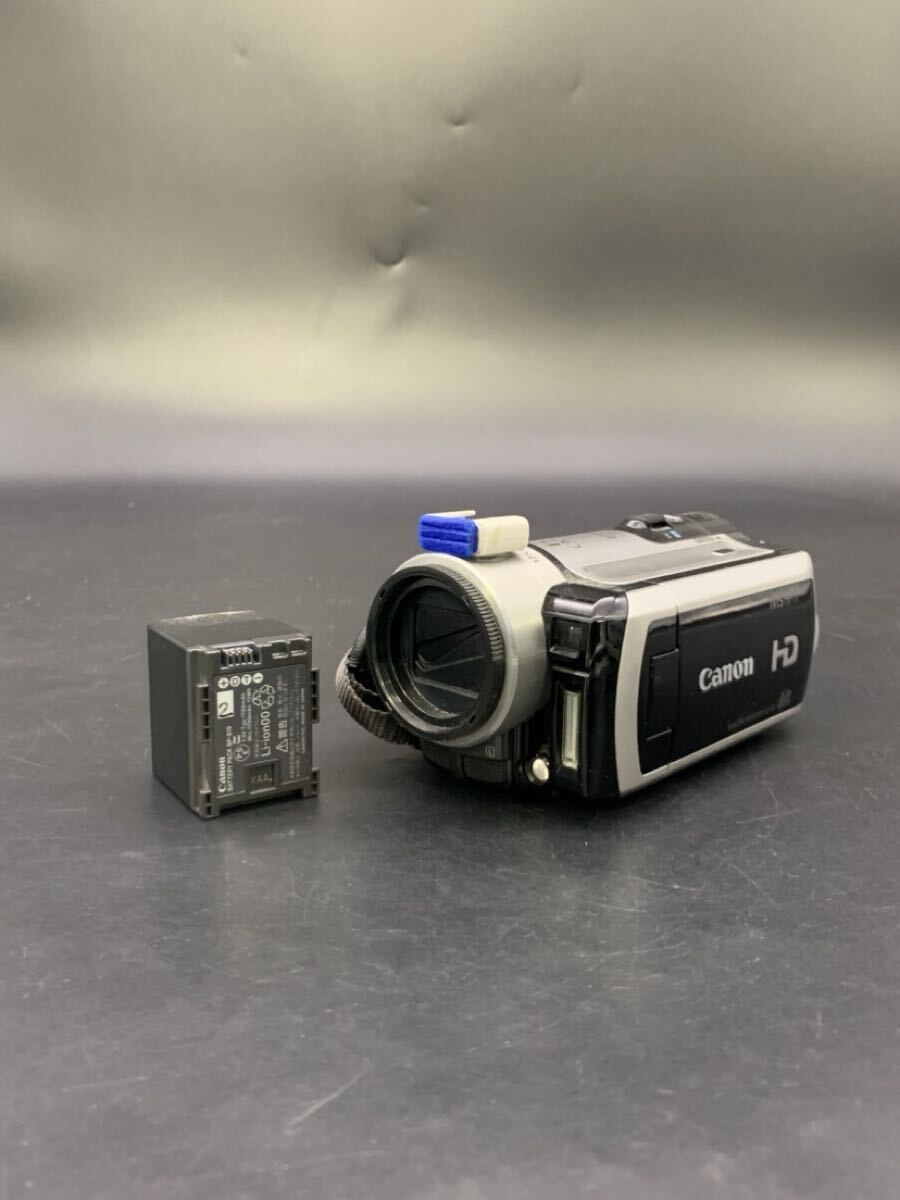 武井 7月 NO.228 Canon キャノン デジタルビデオカメラ ivis HF11 OPTICAL 汚れ傷あり ブラック シルバー 充電器なし 通電動作未確認 拍卖