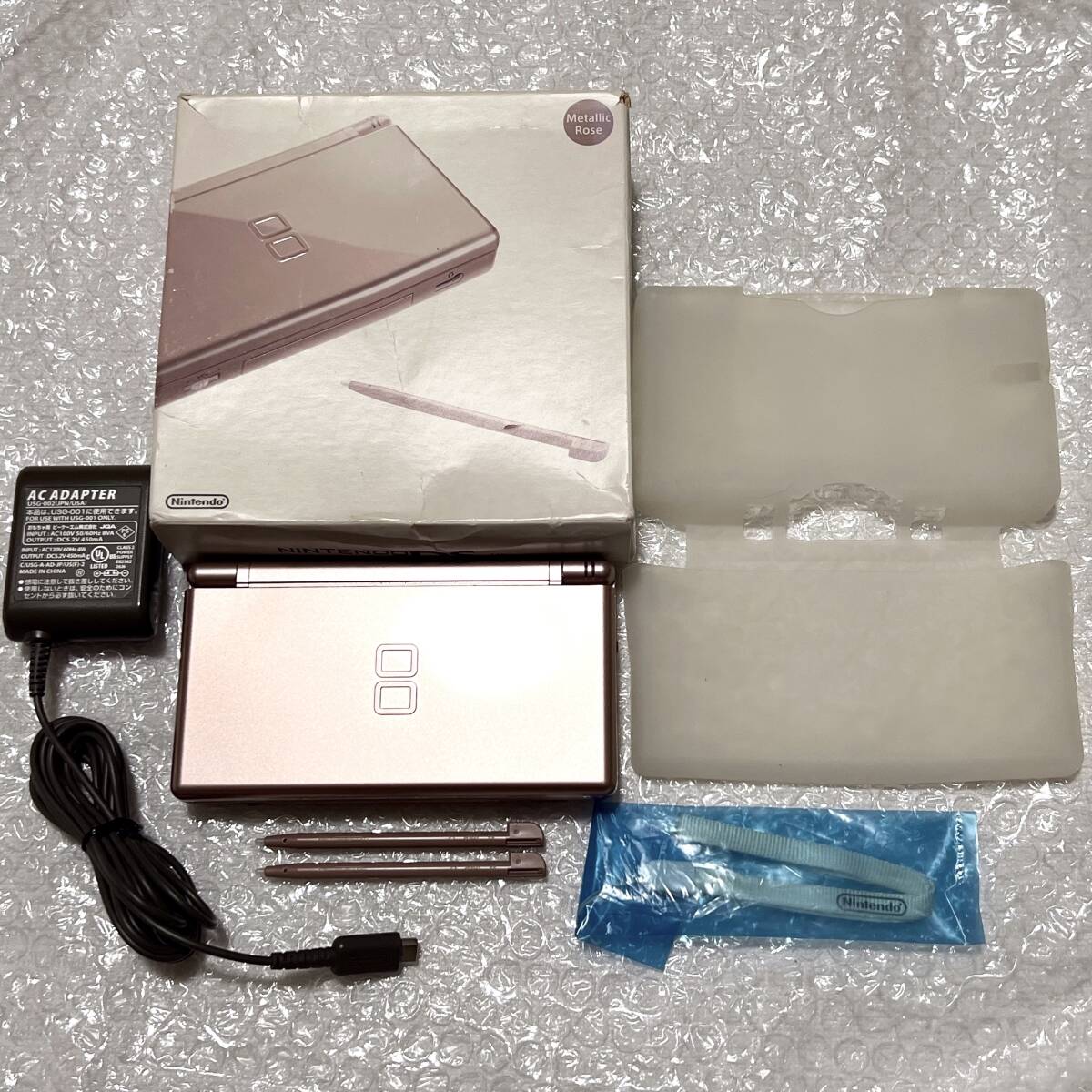 〈本体極美品・画面無傷・動作確認済み〉ニンテンドーDS Lite 本体 メタリックロゼ USG-001 シリコンカバー NINTENDO拍卖